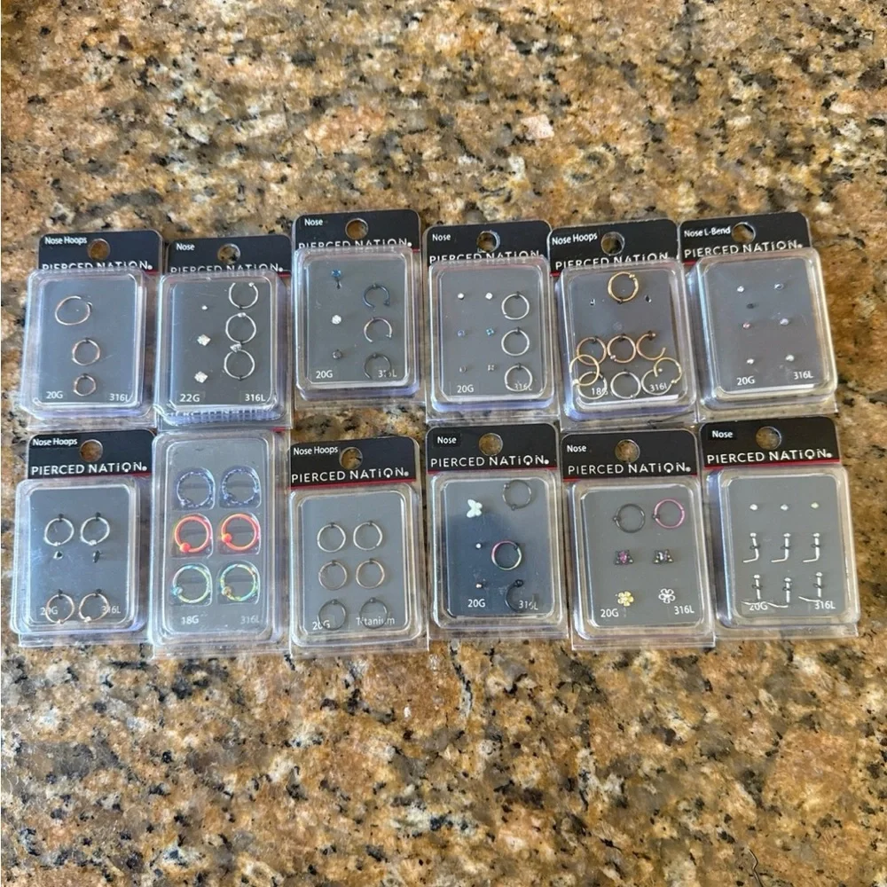 Pierced Nation nose hoops and studs in different sizes, colors, and styles.